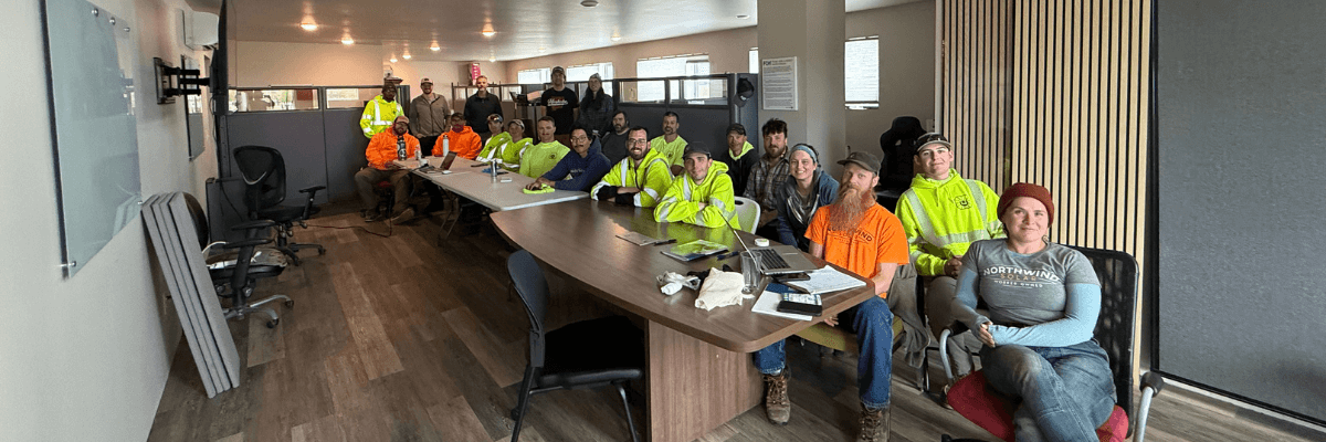 Northwind Solar worker-owners gathered around a conference table
