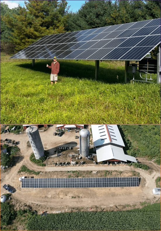 Ground-mounted solar array in a field with a farm in the background
